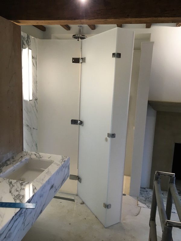 Bespoke frosted glass shower enclosure in Clapham Junction luxury bathroom