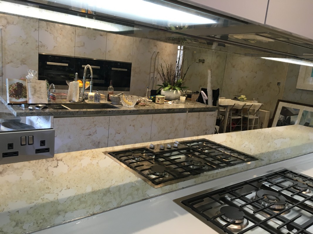 Mirror glass splashback in Clapham Junction luxury kitchen